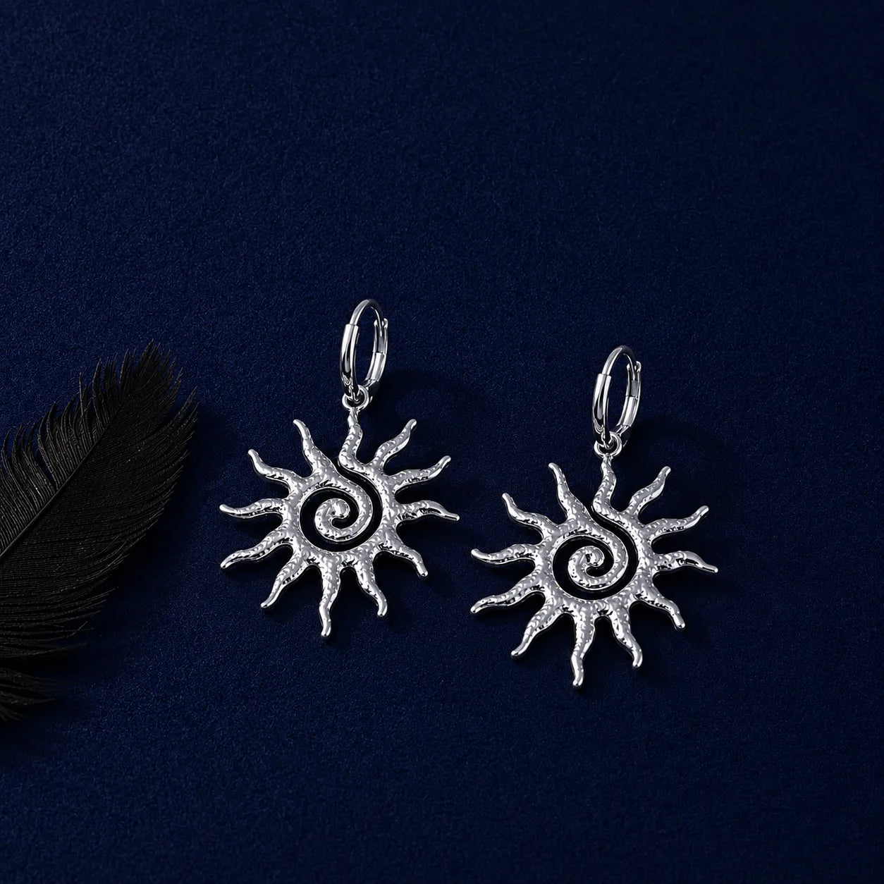 L'Aube — Médaille du Soleil en spirale