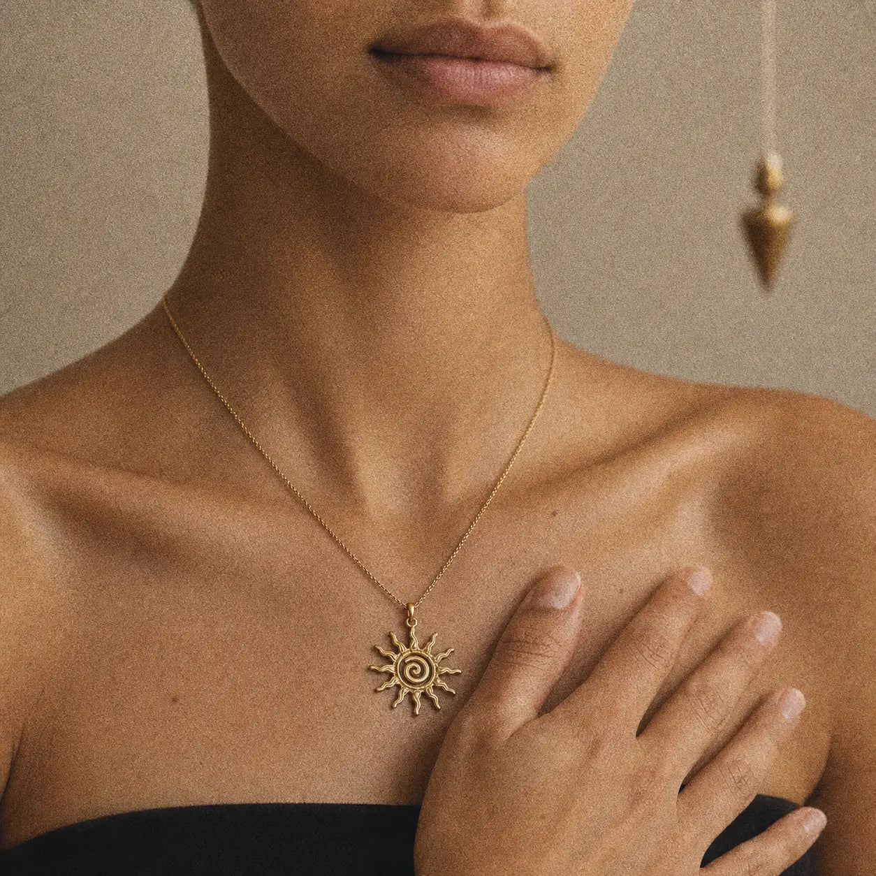 L'Aube — Médaille du Soleil en spirale